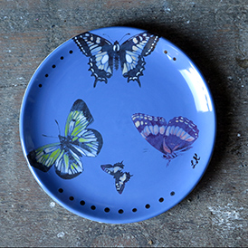 Schmetterlinge auf Teller